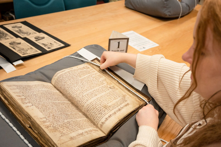 A student studies a history book